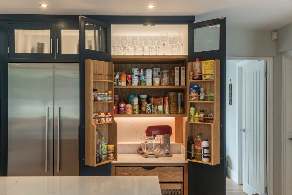 Larder unit with oak bottle rack and marble top