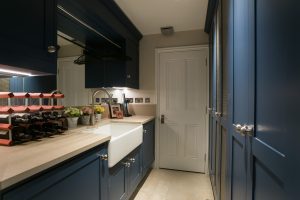 Classic contemporary utility with Belfast sink and a pull out tap