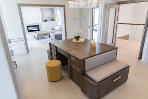 Stained oak island with seating area