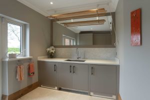 Utility with pully above