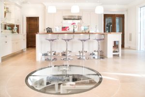 Contemporary kitchen with wine cellar