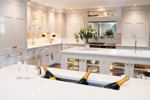 Kitchen island with a built-in champagne/wine trough