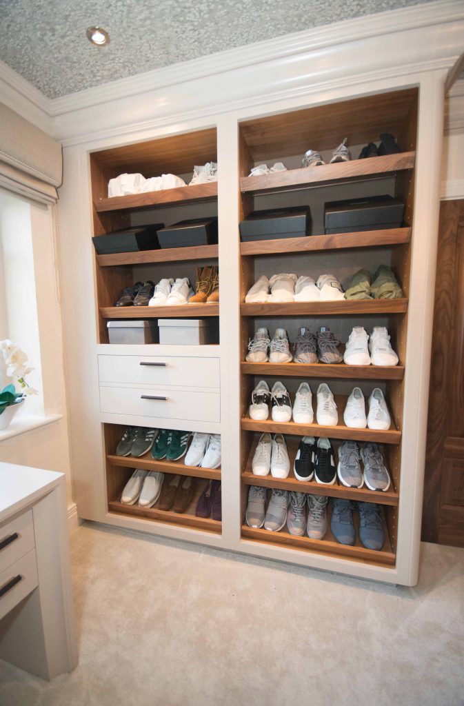 Shoe storage with black walnut angled shoe shelves