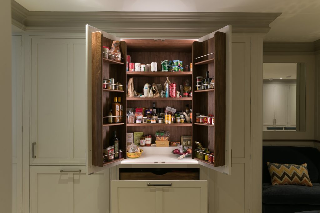 Black walnut internal larder with bottle rack storage and stone top
