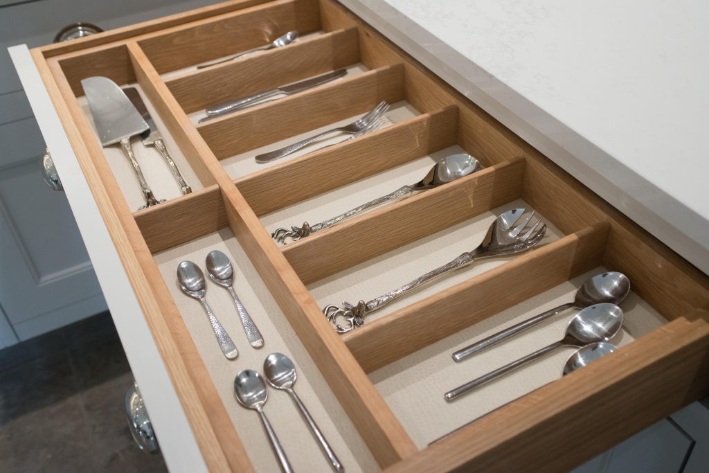 Cutlery insert with faux ostrich base