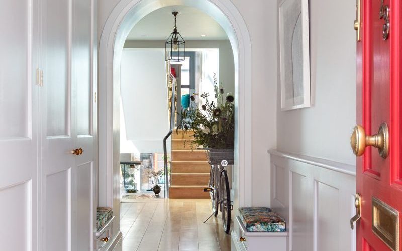 Entrance hallway with fitted wardrobes and bench seating